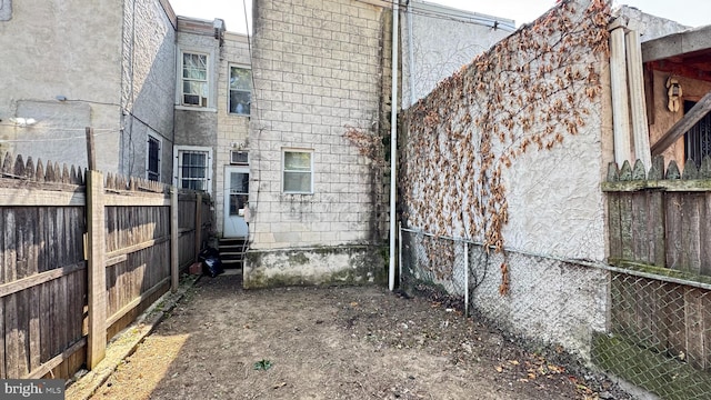 3436 D St, Philadelphia, PA 19134 - view of property exterior featuring entry steps and a fenced backyard