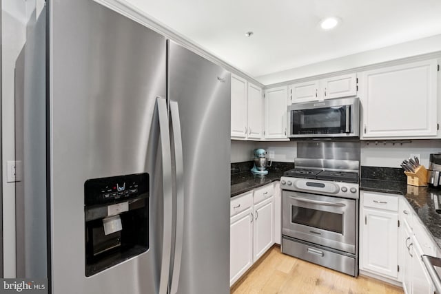 11736 Rockaway Ln Unit 101, Fairfax, VA 22030 - kitchen featuring stainless steel appliances, light wood-style floors, white cabinets, and recessed lighting