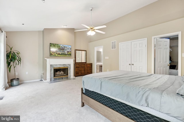 11736 Rockaway Ln Unit 101, Fairfax, VA 22030 - bedroom featuring carpet, a premium fireplace, vaulted ceiling, and ensuite bathroom