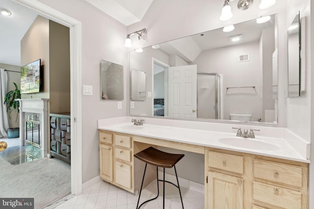 11736 Rockaway Ln Unit 101, Fairfax, VA 22030 - full bathroom with double vanity, tile patterned flooring, and an enclosed shower