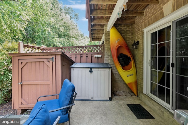 11736 Rockaway Ln Unit 101, Fairfax, VA 22030 - view of patio / terrace featuring a shed