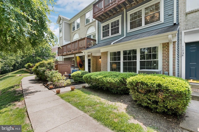 11736 Rockaway Ln Unit 101, Fairfax, VA 22030 - view of front of house with brick siding and a balcony