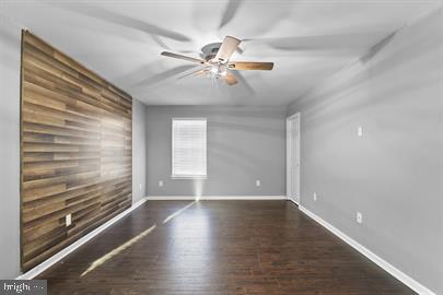 362 Harvest Grove Trl, Dover, DE 19901 - unfurnished room featuring ceiling fan and wood finished floors