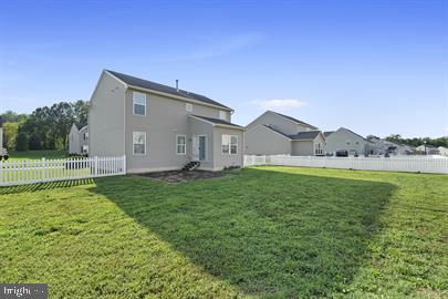362 Harvest Grove Trl, Dover, DE 19901 - back of property featuring a fenced backyard