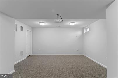 362 Harvest Grove Trl, Dover, DE 19901 - basement featuring carpet and baseboards