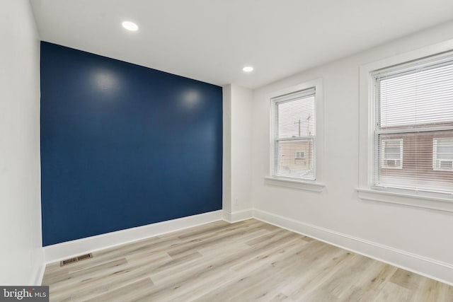 3287 Edgemont St, Philadelphia, PA 19134 - unfurnished room with light wood finished floors and recessed lighting