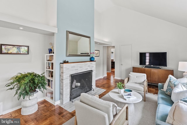 7001 Sycamore Ave, Takoma Park, MD 20912 - living area with high vaulted ceiling, a tile fireplace, and recessed lighting
