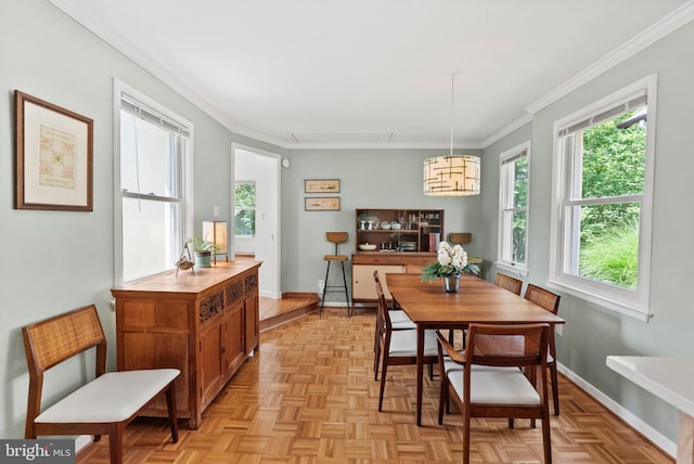 7001 Sycamore Ave, Takoma Park, MD 20912 - dining room featuring healthy amount of natural light, ornamental molding, and attic access