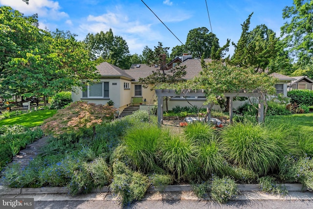 7001 Sycamore Ave, Takoma Park, MD 20912 - back of house featuring stucco siding and roof with shingles