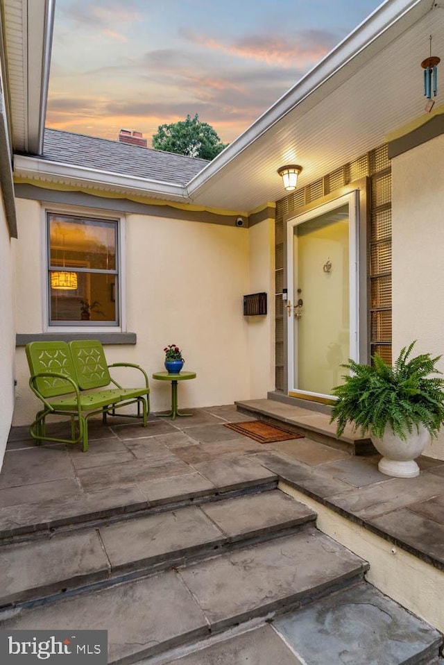 7001 Sycamore Ave, Takoma Park, MD 20912 - entrance to property featuring stucco siding and a patio