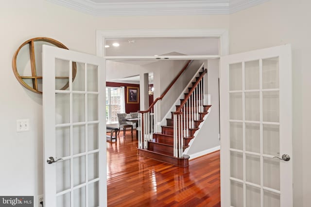 42066 Fiddlehead Pl, Aldie, VA 20105 - foyer featuring stairs, ornamental molding, wood finished floors, and french doors