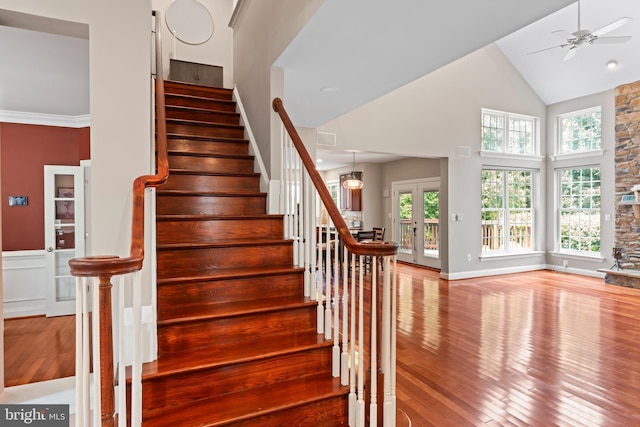 42066 Fiddlehead Pl, Aldie, VA 20105 - stairs featuring a ceiling fan, hardwood / wood-style flooring, and high vaulted ceiling