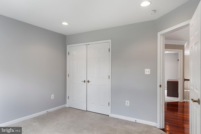 42066 Fiddlehead Pl, Aldie, VA 20105 - unfurnished bedroom with a closet, recessed lighting, and light carpet