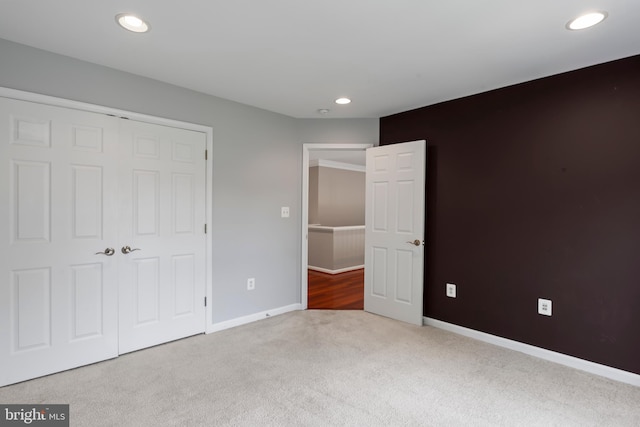 42066 Fiddlehead Pl, Aldie, VA 20105 - unfurnished bedroom with carpet floors, a closet, and recessed lighting