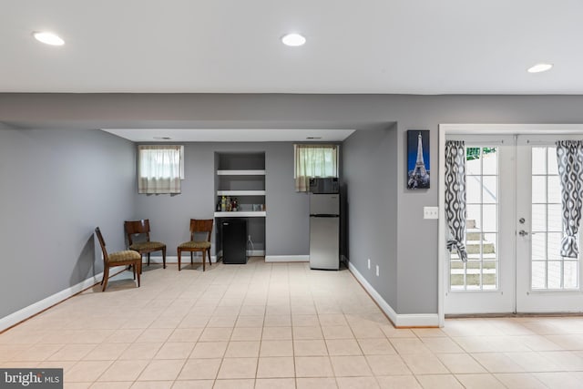42066 Fiddlehead Pl, Aldie, VA 20105 - living area with recessed lighting, french doors, and light tile patterned flooring