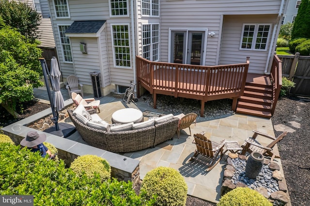42066 Fiddlehead Pl, Aldie, VA 20105 - wooden deck featuring a patio and an outdoor hangout area