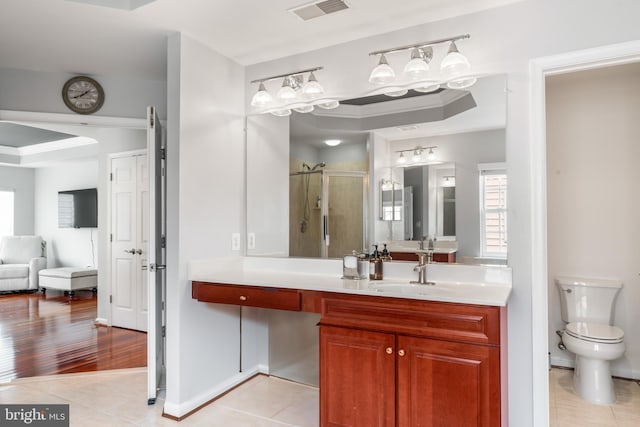 42066 Fiddlehead Pl, Aldie, VA 20105 - bathroom featuring a shower stall, tile patterned flooring, vanity, and a raised ceiling