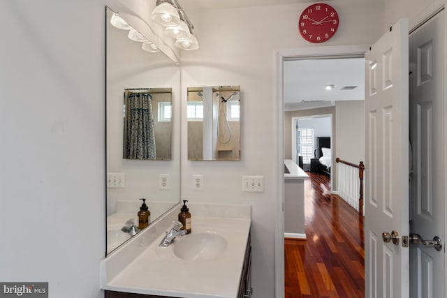 42066 Fiddlehead Pl, Aldie, VA 20105 - bathroom with vanity and wood finished floors