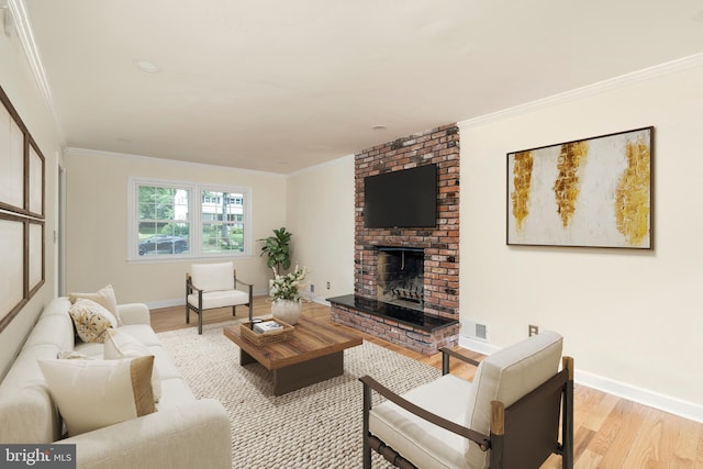 76 Stonicker Dr, Lawrence, NJ 08648 - living room featuring light wood-style flooring, a fireplace, and crown molding