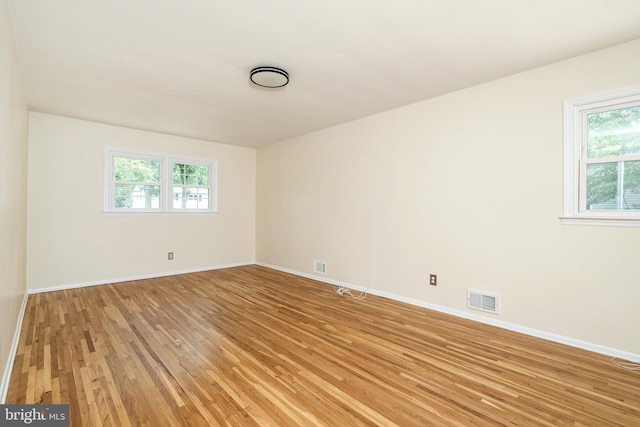 76 Stonicker Dr, Lawrence, NJ 08648 - unfurnished room with light wood-style floors and baseboards