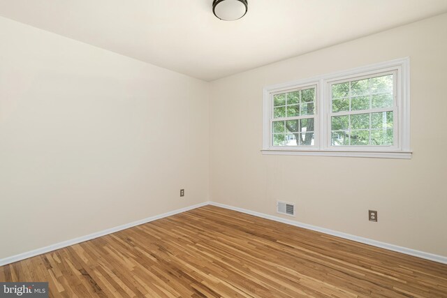 76 Stonicker Dr, Lawrence, NJ 08648 - spare room with light wood-style floors and baseboards