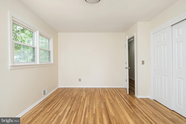 76 Stonicker Dr, Lawrence, NJ 08648 - unfurnished bedroom featuring light wood-style flooring and a closet
