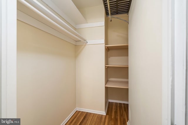 76 Stonicker Dr, Lawrence, NJ 08648 - walk in closet with wood finished floors