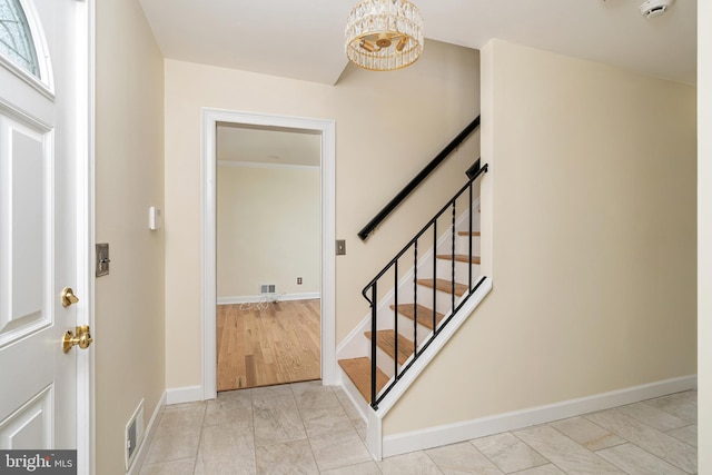 76 Stonicker Dr, Lawrence, NJ 08648 - entryway featuring a chandelier, stairway, and light marble finish flooring