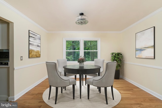 76 Stonicker Dr, Lawrence, NJ 08648 - dining area with crown molding and light wood-style floors