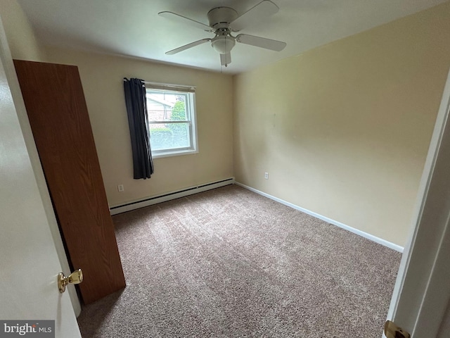 305 Reservoir Rd, Mechanicsburg, PA 17055 - unfurnished bedroom with baseboard heating, carpet, and ceiling fan