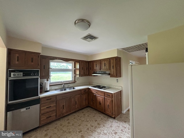 305 Reservoir Rd, Mechanicsburg, PA 17055 - kitchen with oven, freestanding refrigerator, dishwasher, light countertops, and under cabinet range hood