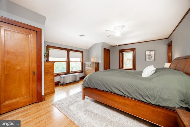 727 W Baltimore Pike, Kennett Square, PA 19348 - bedroom with radiator, light wood-style floors, a ceiling fan, and lofted ceiling