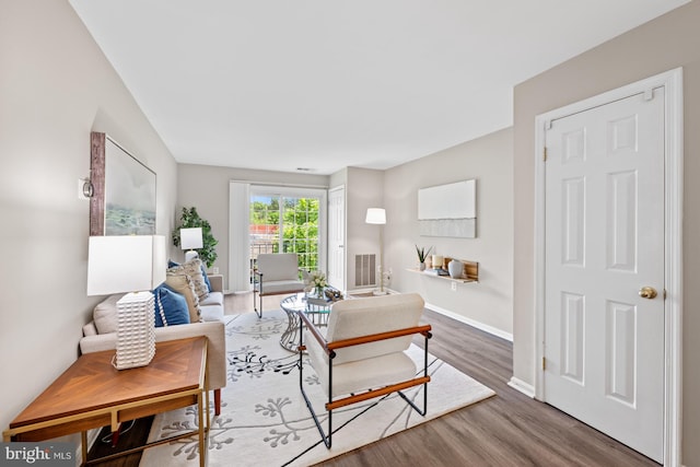 2050 N Calvert St Unit 410, Arlington, VA 22201 - living area with wood finished floors and baseboards
