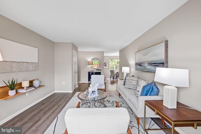 2050 N Calvert St Unit 410, Arlington, VA 22201 - living area featuring wood finished floors and baseboards