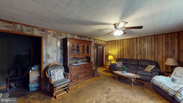 10495 Knobley Rd, Keyser, WV 26726 - carpeted living room featuring a ceiling fan and wooden walls