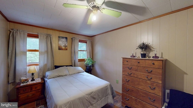 10495 Knobley Rd, Keyser, WV 26726 - bedroom with ornamental molding, multiple windows, a ceiling fan, and wood finished floors