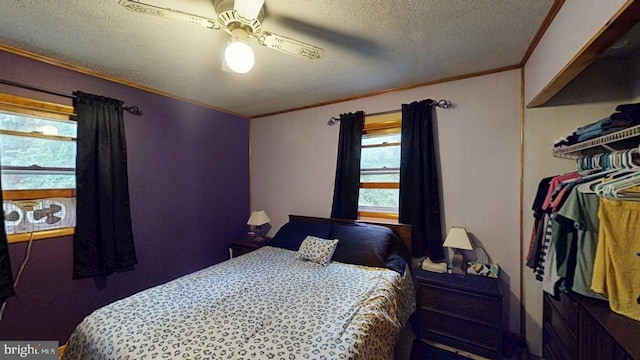 10495 Knobley Rd, Keyser, WV 26726 - bedroom with a textured ceiling, crown molding, and ceiling fan