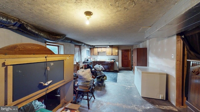 10495 Knobley Rd, Keyser, WV 26726 - basement featuring refrigerator and a textured ceiling