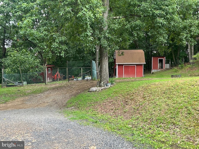 10495 Knobley Rd, Keyser, WV 26726 - view of yard with a storage shed and gravel driveway
