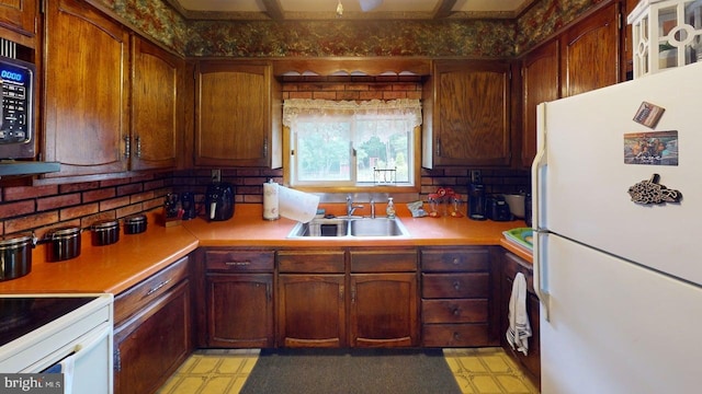 10495 Knobley Rd, Keyser, WV 26726 - kitchen with freestanding refrigerator, light floors, light countertops, and stainless steel microwave