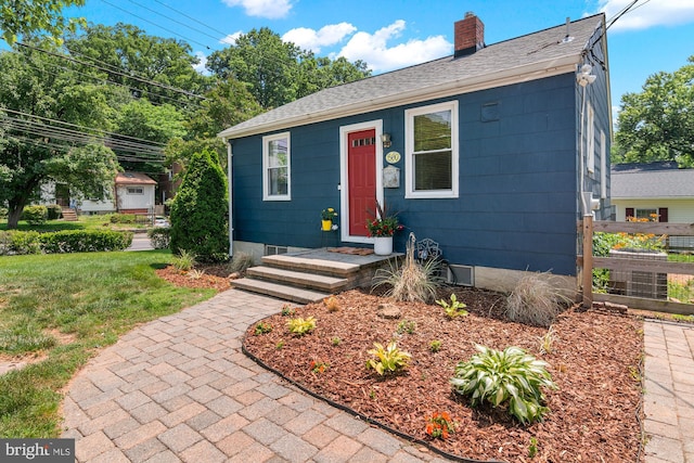 500 Maiden Choice, Catonsville, MD 21228 - bungalow-style home with a chimney, a shingled roof, and a front lawn