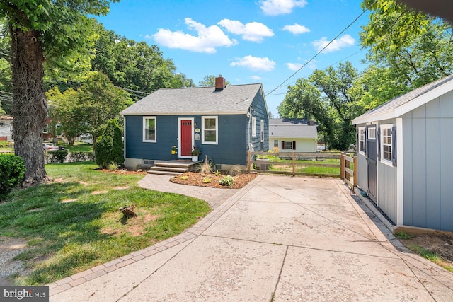 500 Maiden Choice, Catonsville, MD 21228 - bungalow-style house with a chimney, a shingled roof, and driveway