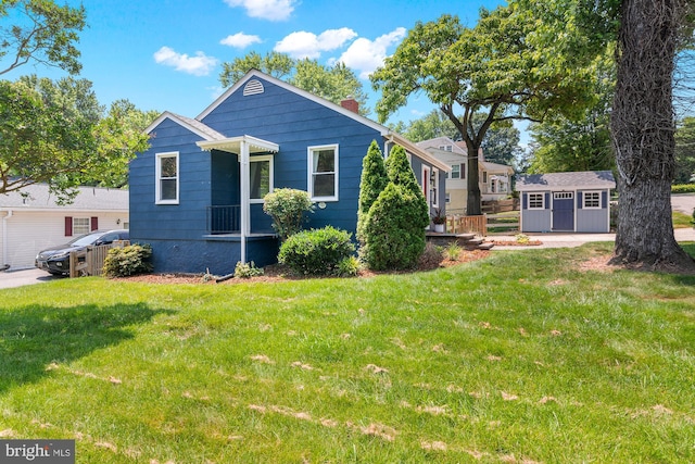 500 Maiden Choice, Catonsville, MD 21228 - view of front of property with a front yard, a storage shed, and a chimney