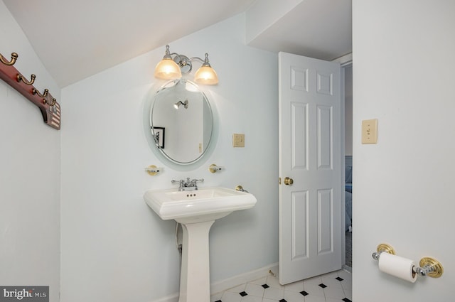 245 Blue Bill Ln Unit 245-D, Havre De Grace, MD 21078 - bathroom featuring baseboards and a sink