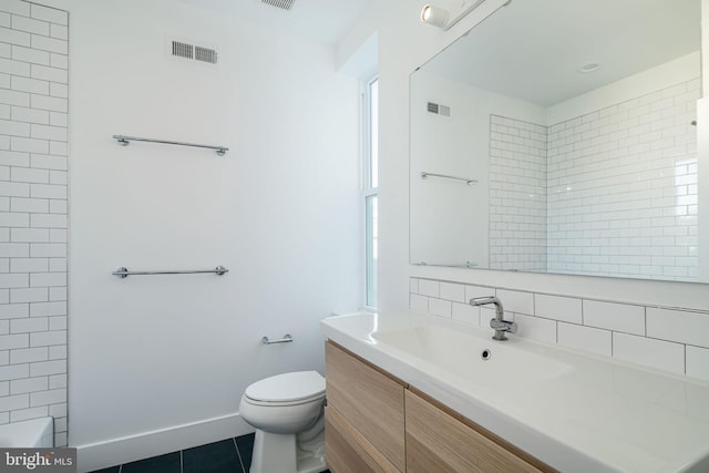 1737 N 28th St, Philadelphia, PA 19121 - full bathroom featuring vanity, backsplash, tile patterned floors, and a shower