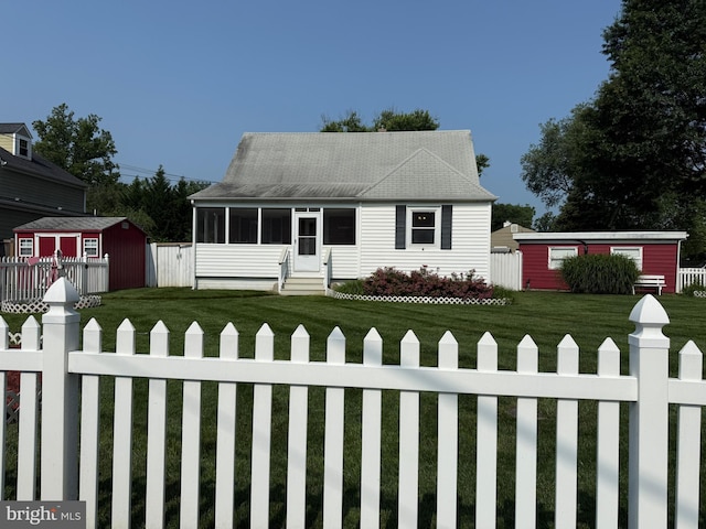 3810 Jancie Rd, Fairfax, VA 22030 - view of front of home featuring a storage shed, a fenced front yard, a sunroom, and entry steps