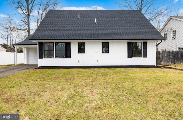 59 Parkside Cir, Willingboro, NJ 08046 - back of house featuring a shingled roof, an attached garage, and driveway