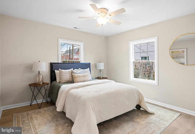 59 Parkside Cir, Willingboro, NJ 08046 - bedroom with wood finished floors and a ceiling fan