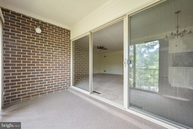 3360 Gleneagles Dr Unit 71-2B, Silver Spring, MD 20906 - unfurnished sunroom featuring a chandelier