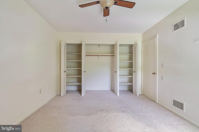 3360 Gleneagles Dr Unit 71-2B, Silver Spring, MD 20906 - unfurnished bedroom featuring carpet, multiple closets, and ceiling fan